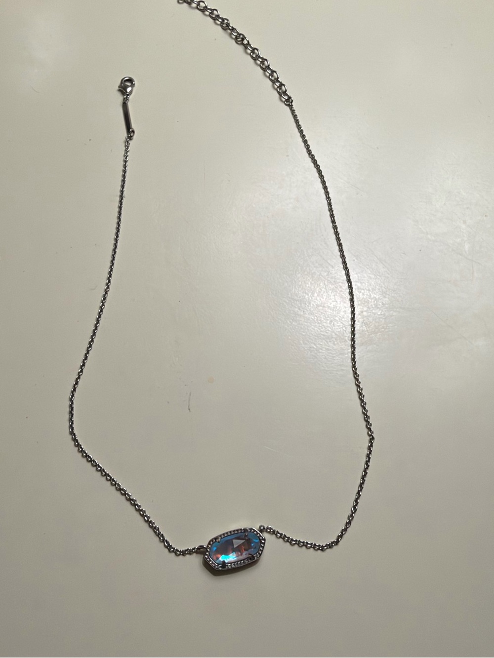 Kendra Scott Silver Necklace with Blue Iridescent Stone